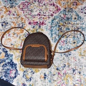 Michael Kors small convertible crossbody/backpack style purse